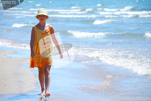 Image of Girl walk beach