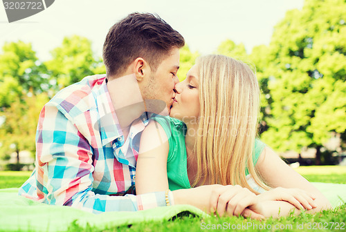 Image of smiling couple in park