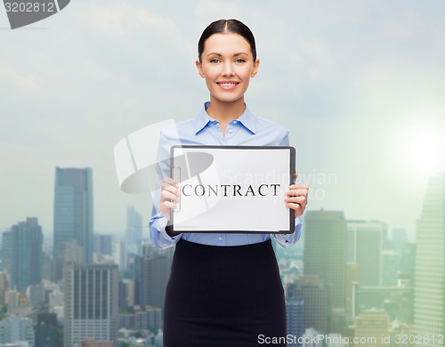 Image of smiling businesswoman with contract