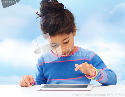 Image of little girl with tablet pc