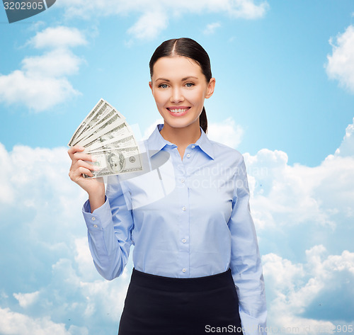 Image of businesswoman with dollar cash money