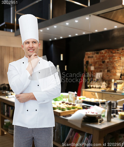 Image of happy male chef cook thinking