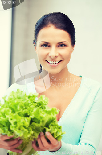 Image of beautiful woman in the kitchen