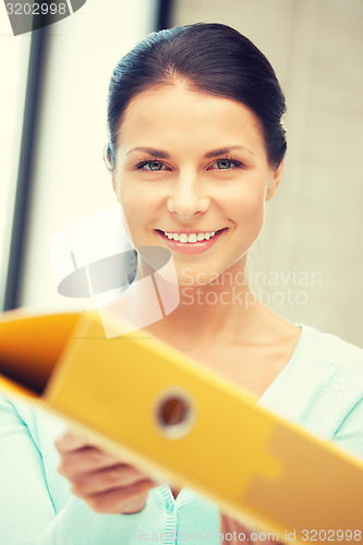 Image of woman with folder