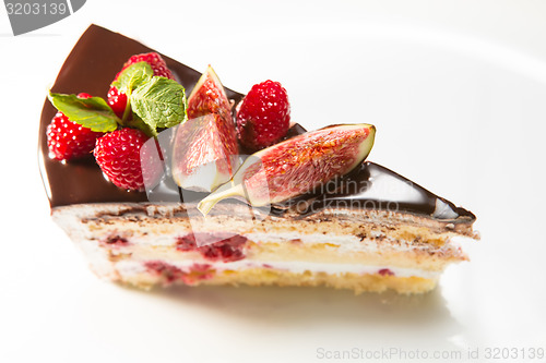 Image of cake with chocolate, fig and raspberry