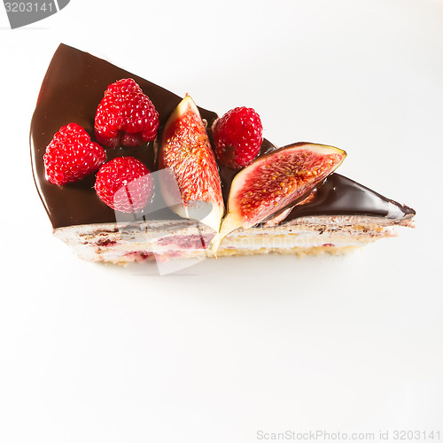 Image of cake with chocolate, fig and raspberry