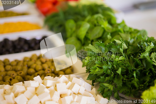 Image of salad bar with vegetables in the restaurant