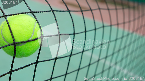 Image of Tennis ball in net