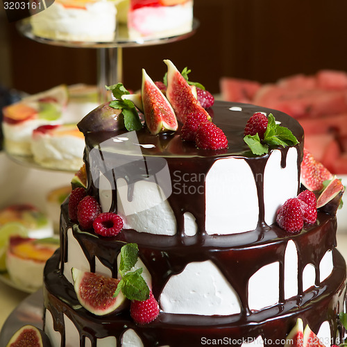 Image of Chocolate cake with figs and raspberries