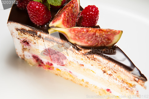 Image of cake with chocolate, fig and raspberry