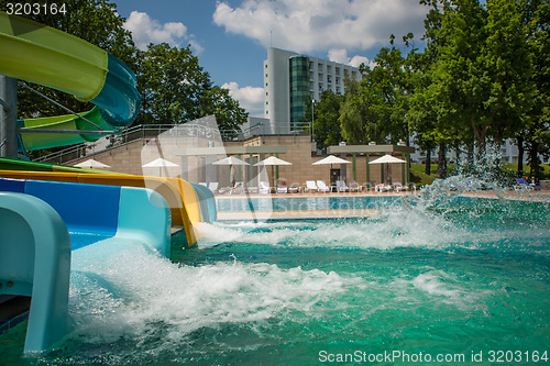 Image of person riding down a water slide