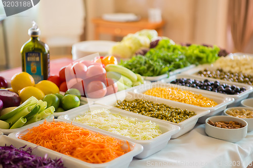 Image of salad bar with vegetables in the restaurant