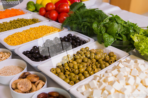 Image of salad bar with vegetables in the restaurant