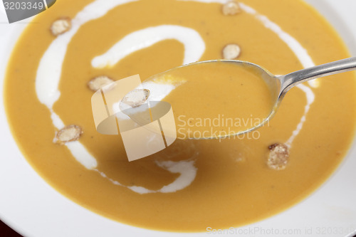 Image of Spoonful of butternut squash soup