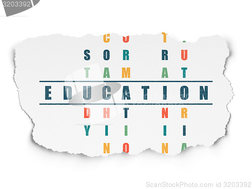 Image of Education concept: word Education in solving Crossword Puzzle