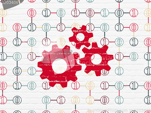 Image of Information concept: Gears on wall background