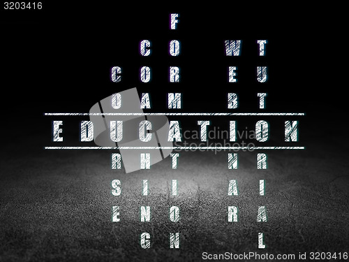 Image of Education concept: word Education in solving Crossword Puzzle