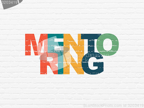 Image of Education concept: Mentoring on wall background