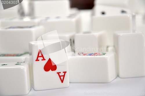 Image of Mahjong set with red Ace