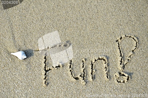 Image of Fun word written on the sand