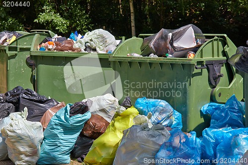 Image of Garbage Containers Full, Overflowing