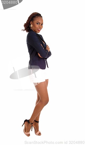 Image of Gorgeous black lady in shorts, profile.