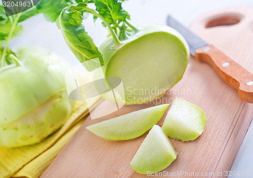 Image of Cabbage kohlrabi on Wooden Kitchen Board