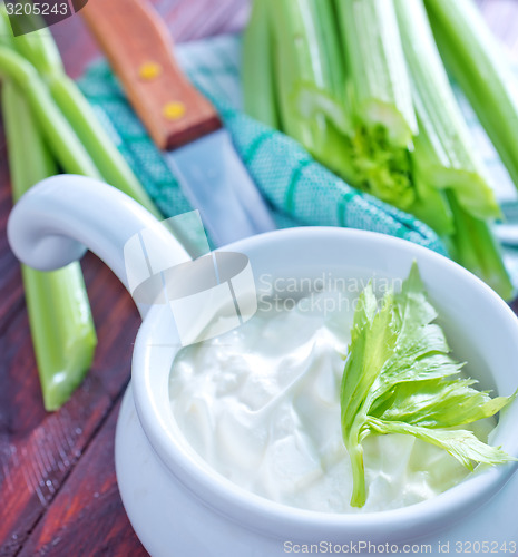 Image of fresh celery and white sauce