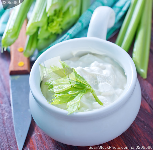 Image of fresh celery and white sauce
