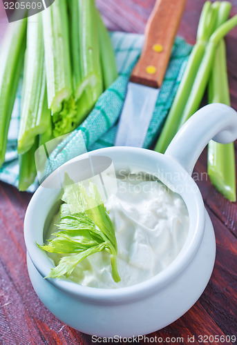 Image of fresh celery and white sauce