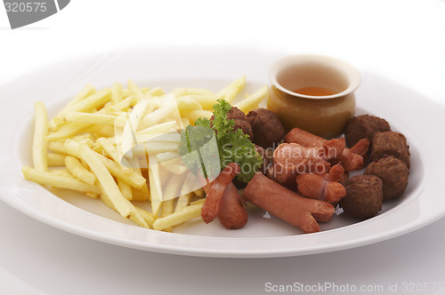 Image of French fries and meatballs