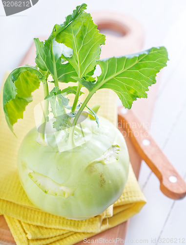 Image of Cabbage kohlrabi on Wooden Kitchen Board