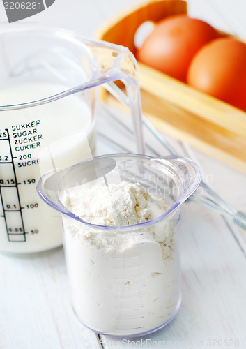 Image of ingredients for dough, eggs, flour and milk