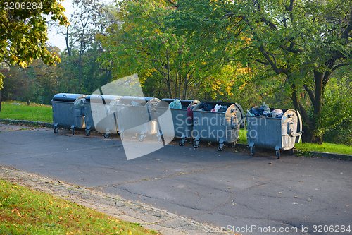 Image of Dumpsters by the walking path