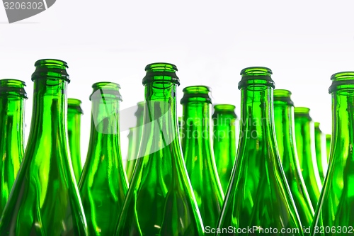 Image of Many bottles on conveyor belt