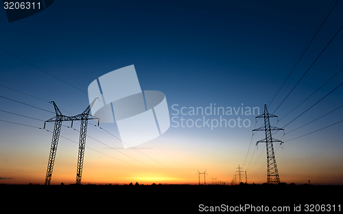 Image of Large transmission towers at blue hour 