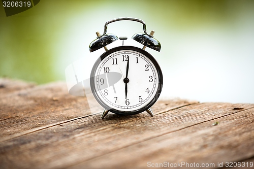 Image of Vintage background with retro alarm clock