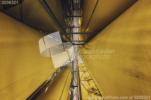 Image of Industrial interior with welded silos