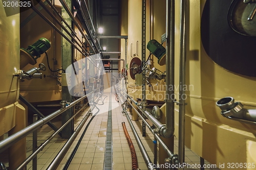 Image of Industrial interior with welded silos