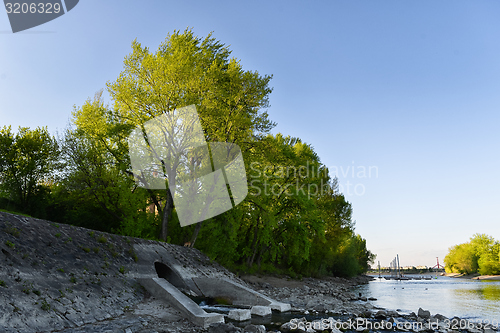 Image of Cooling water flowing into the river