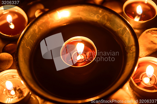 Image of Candles burning at altar