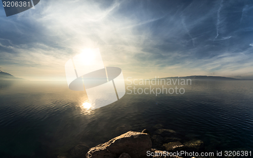 Image of Beach with rocks and a cloudy sky