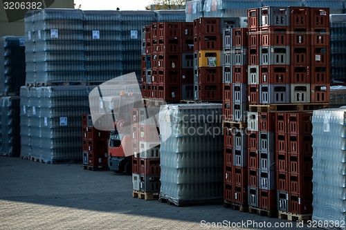 Image of Many bottles on conveyor belt