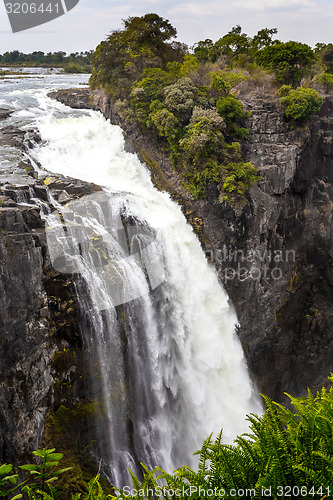 Image of The Victoria falls with mist from water