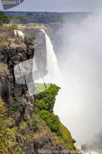 Image of The Victoria falls with mist from water