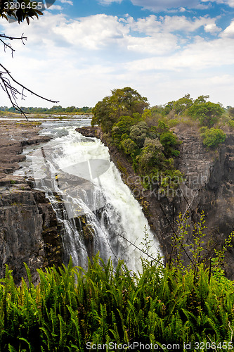 Image of The Victoria falls with mist from water