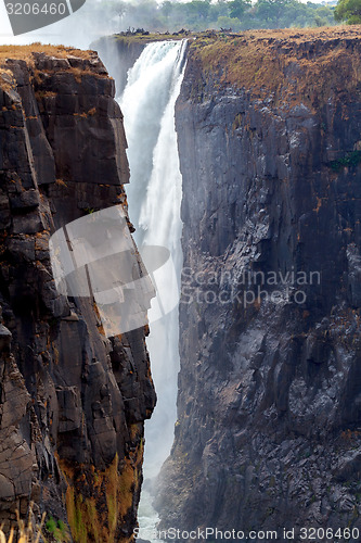 Image of The Victoria falls with mist from water