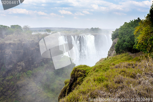 Image of The Victoria falls with mist from water