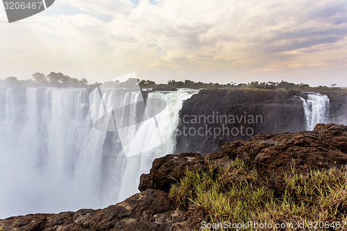 Image of The Victoria falls with mist from water