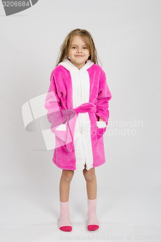 Image of Portrait of a six-year growth girl in bathrobe